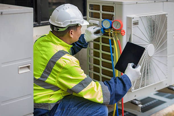 Professional Heat Pump Repair technician working in Cocoa Beach, FL